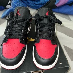 Unisex big kids air jordans 1 low